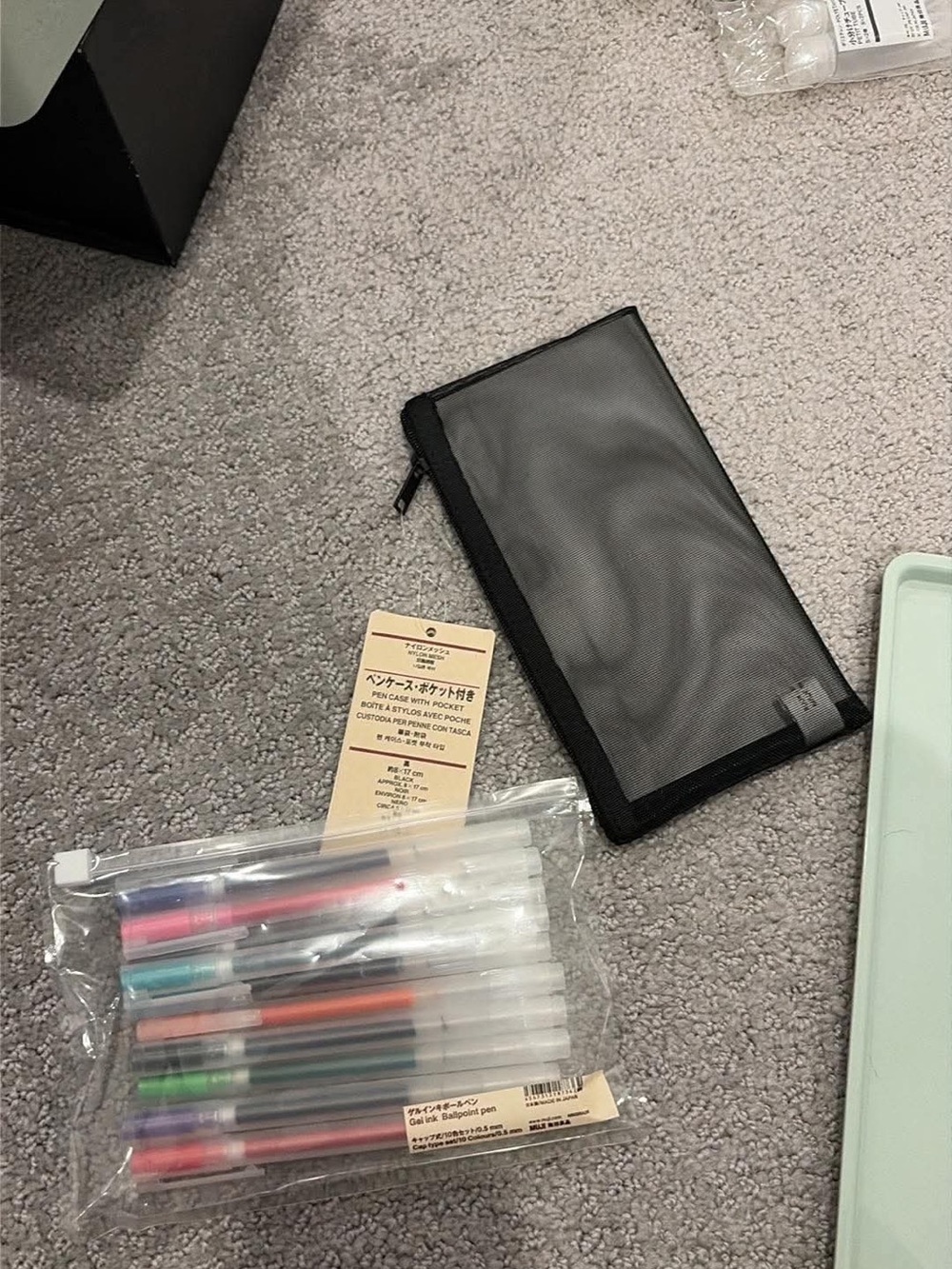 Muji 0.5 pens with with black mesh case